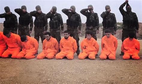 isis jihadis behead 12 security officers in libya and use their bodies to block road world