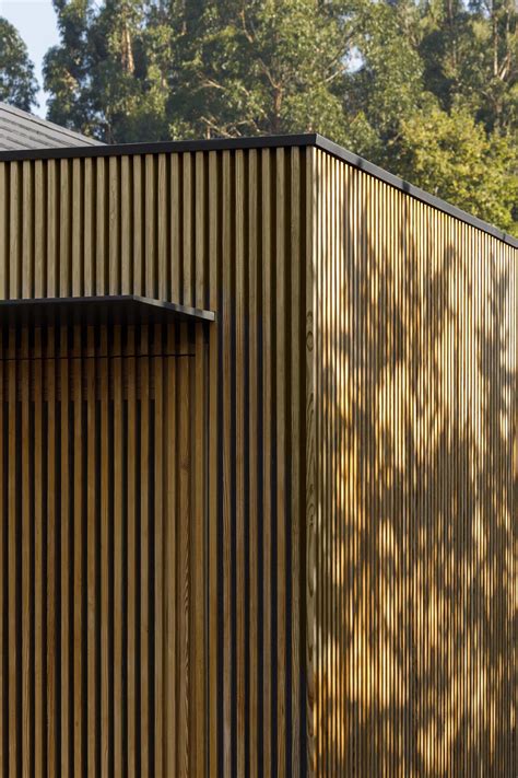 Wood Slats On The Exterior Of This House Hide Some Windows And Doors