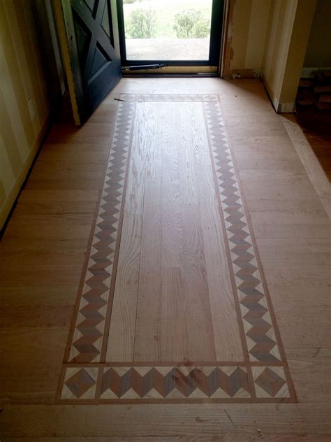 Beautiful Wood Border To Accent A Hallway Leading To An Entry Wood