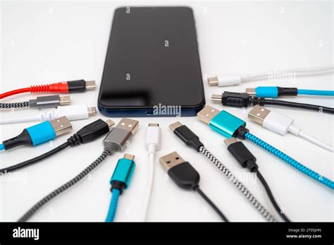 Smartphones Cables And Usb Plugs Of Different Types Evolution And