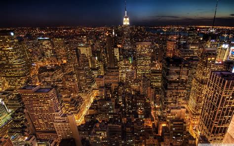 Aerial Photo Of High Rise Buildings During Night Time Hd Wallpaper