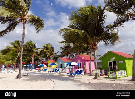 Colorful Beach Huts Front The Caribbean Sea On The Bahamian Island Of