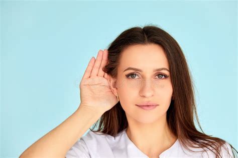 Woman Holds Her Hand Near Ear And Listens Carefully Stock Image Image