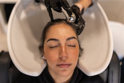 Calm Woman Getting Hair Wash In Sink Stock Photo Image Of Client