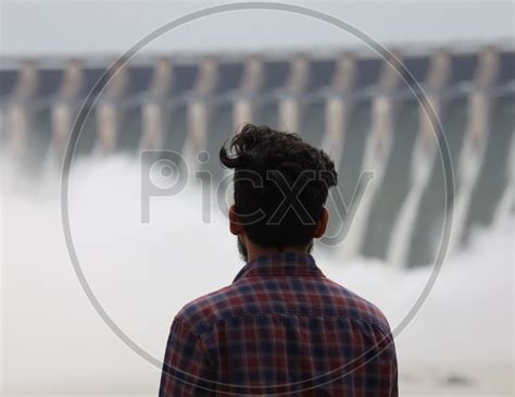 Image Of Visitor Young Man Watching Nagarjuna Sagar Dam Gates Opened