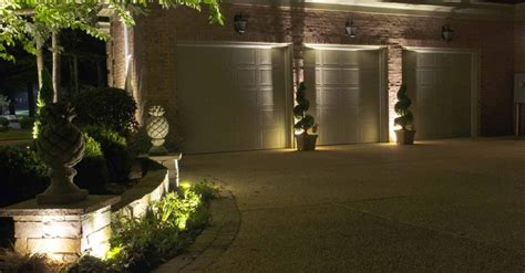 Knight Scapes Landscape Lighting And Irrigation Control Garage Exterior