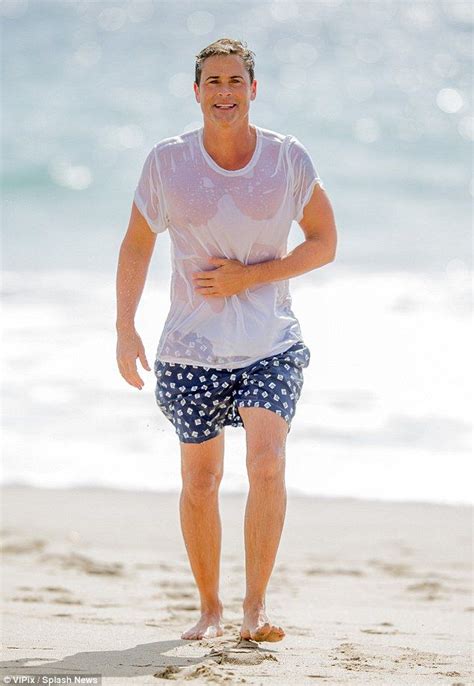 rob lowe 51 shows off his muscular torso while bodysurfing in malibu rob lowe muscular