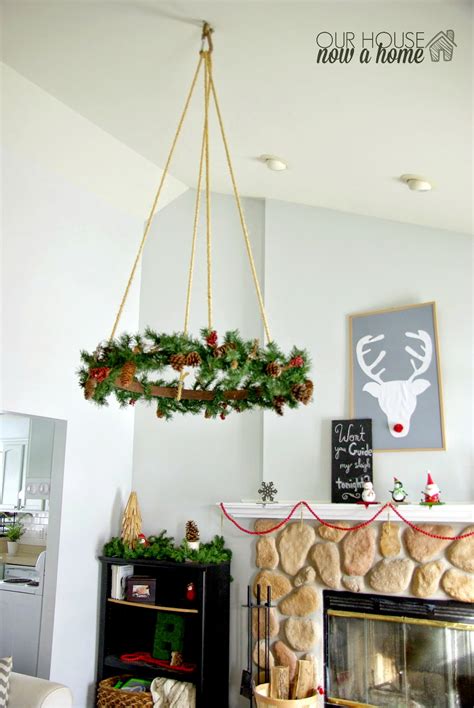 High ceilings are great, but they can pose some unique decorating challenges. Ceiling hanging Christmas wreath • Our House Now a Home