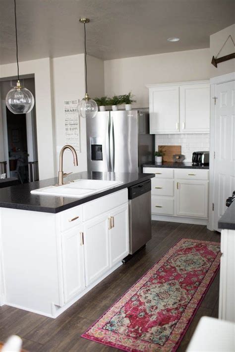 Gold Accents And A Modern White Kitchen White Modern Kitchen Modern