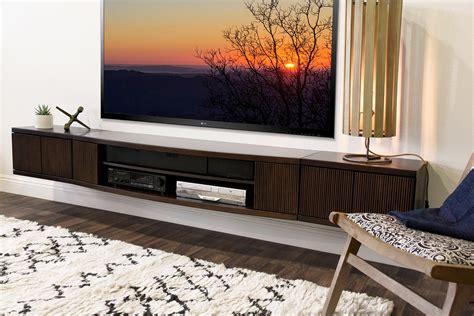This floating shelf with wire management features is ideal for use even in smaller spaces. Floating Wall Mount Entertainment Center TV Stand - Curve ...