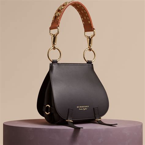 An Equestrian Inspired Runway Satchel In Smooth Bridle And Grainy