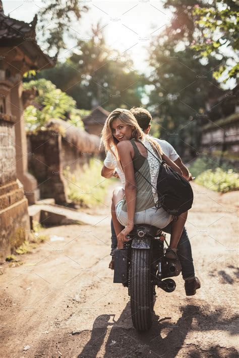 Young Couple Riding Motorcycle ~ People Photos ~ Creative Market