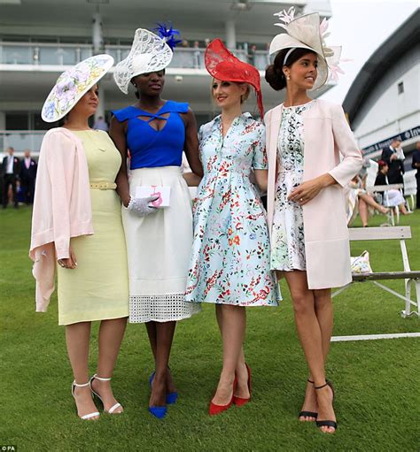 Racegoers Turn Epsom Into A Riot Of Colour On Ladies Day Daily Mail