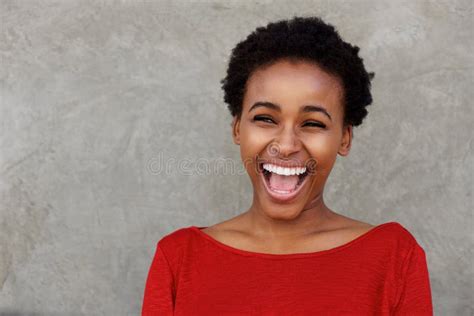 Beautiful Young Black Woman Laughing With Open Mouth Stock Image