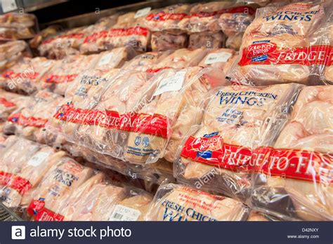 Kirkland signature is the premium house brand at costco wholesale. Chicken wings on display at a Costco Wholesale Warehouse Club Stock Photo: 54150851 - Alamy