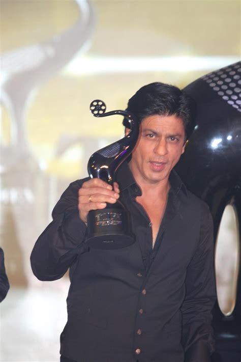 Shah Rukh Khan Posing With Toifa Trophy At The Launch Of The Times Of India Film Awards In
