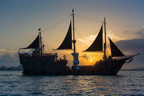 A small vessel that is propelled. Cancun Pirate Boat Trips - Pirate Show Cancun