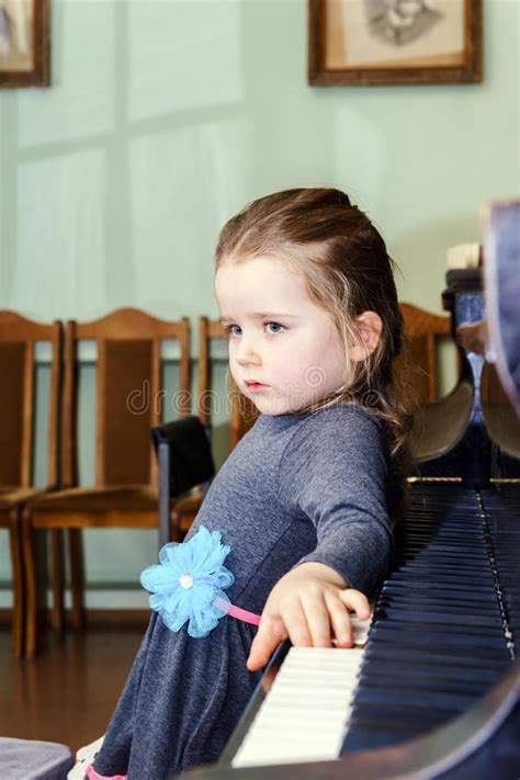 Cute Little Girl Playing Grand Piano Stock Photo Image Of Musician