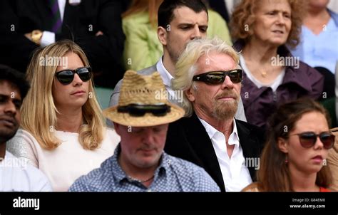 Sir Richard Branson And His Daughter Holly Left Watches The Action On Centre Court During Day