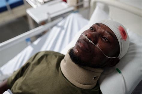Premium Photo Military Man With Bleeding Head Injury