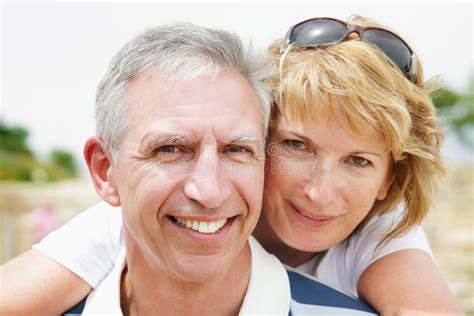 Mature Couple Smiling And Embracing Stock Image Image Of Back