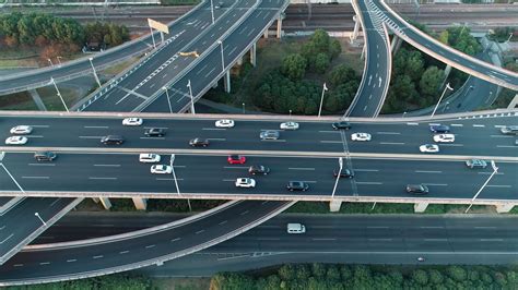 Aerial View Of Road Junction With Moving Cars Road Interchange Or