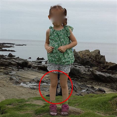 Image Of Feet Behind Girl On A Japanese Shore Sparks Internet Frenzy