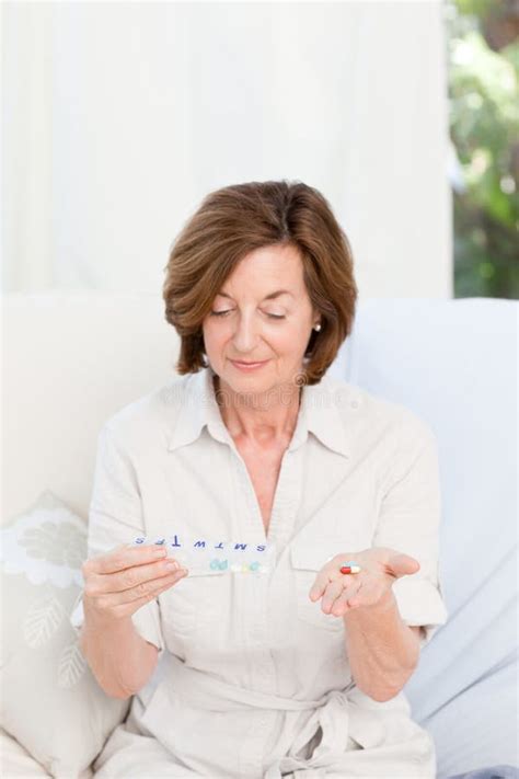 cute mature woman with pills stock image image of adult isolate 18108051