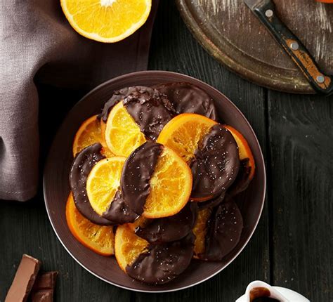 Candied Orange Slices Dipped In Rich Dark Chocolate Olivemagazinegr