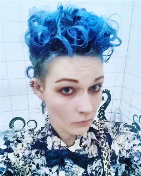 Androgynous haircuts can seem so modern that they're untouchable. Curly blue mohawk Androgynous boyish look Tomboy bowtie ...