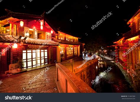 Wonderful Night Scene Of Chinese Architecture Building And Romantic
