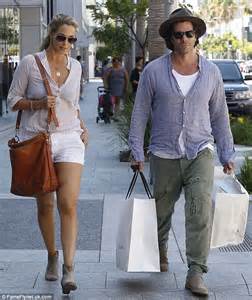 elizabeth berkley s husband greg lauren takes care of her bags on serious beverly hills shopping