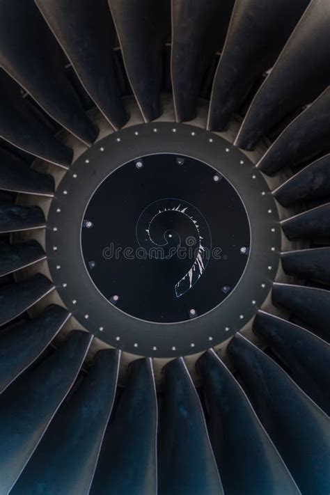 Vertical Close Up Of The Jet Engine Round And Powerful Turbine Blades