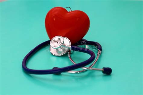 Red Heart And A Stethoscope On Desk Stock Image Image Of Examination