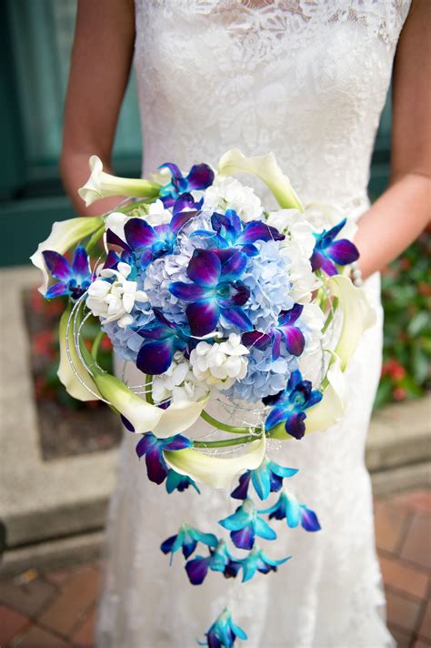 Contemporary Cascading Bouquet Featuring Blue Bom Dendrobium Orchids In