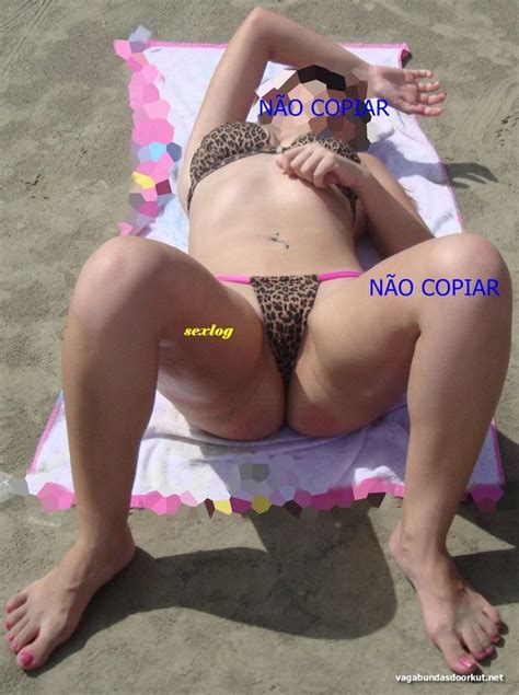 Esposa rabuda se exibindo na praia de biquíni Safadas na Web