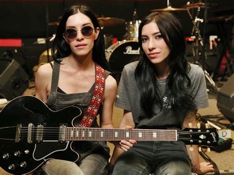 The Veronicas Think Getting Their New Latex Outfits On And Off In Two
