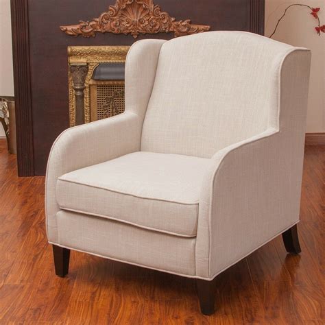 Chaises and accent chairs for living rooms (and beyond!) add instant personality to any room with a stunning ethan allen living room chair, upholstered in your favorite fabric or leather. Living Room Furniture Natural Fabric Wingback Club Chair ...