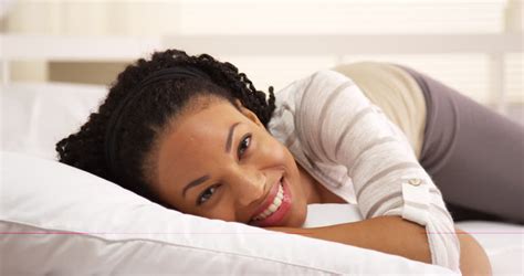 Attractive Black Woman Lying On Bed Smiling Stock Footage Video 7320625