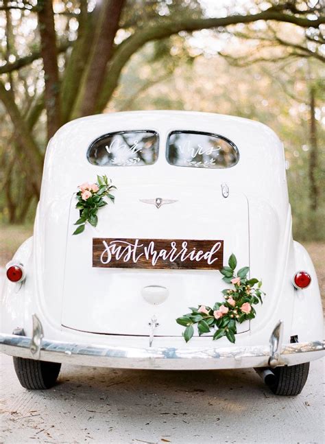 Custom Calligraphy Just Married Sign And Delicate Florals On Our