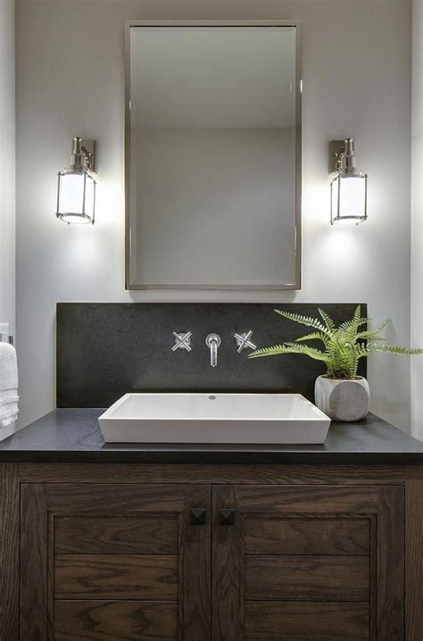 Maybe you would like to learn more about one of these? Bathroom features a custom Oak vanity with dark quartz ...