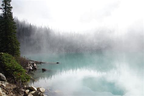 Morning Mist Rising From Turquoise Lake Stock Image Image Of Lake