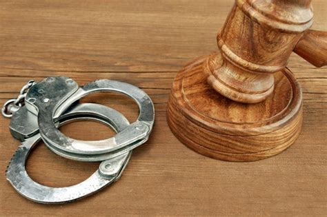 Handcuffs And Gavel Tellez Law Firm
