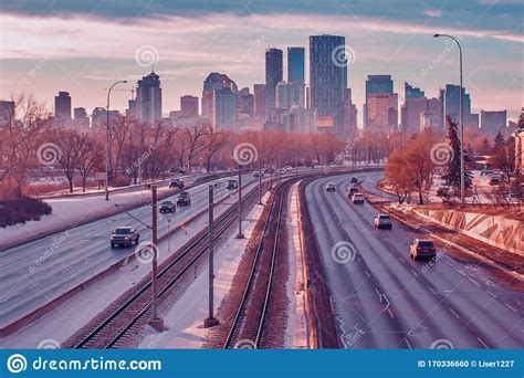 Sunset Sky Falling Down Over Downtown Calgary Traffic Stock Photo