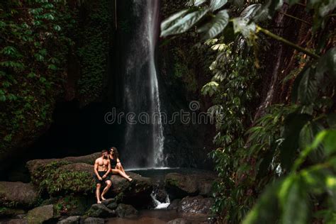 A Couple In Love On A Waterfall Honeymoon Trip Happy Couple On The Island Of Bali Beautiful