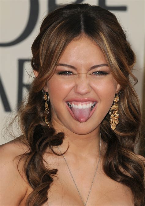 10 Photos That Show Miley Cyrus Has Been Sticking Her Tongue Out For