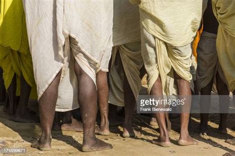 male pilgrims wearing the traditional dhoti at the sangam the news photo getty images
