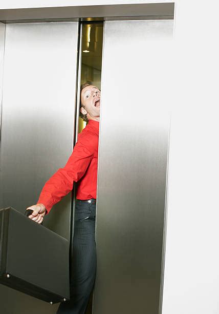 Best Stuck In Elevator Stock Photos Pictures And Royalty Free Images