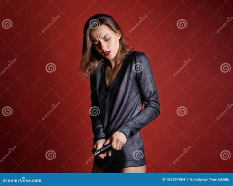 Sensual Woman Loading A Gun On Red Background Crime Scene With Shoot And Shoot Woman Loading A