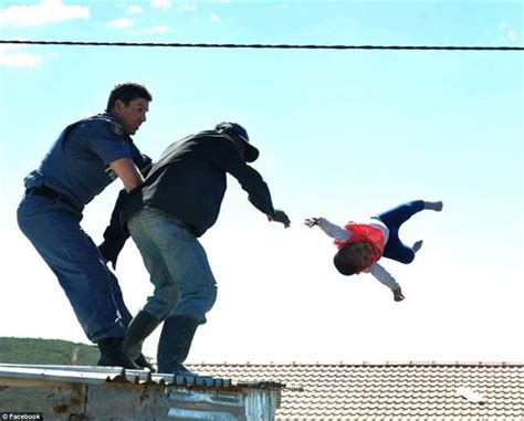 South African Man Throws His Babe Off The Roof Of Their Shack Daily Mail Online